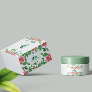 Printed blister box for cosmetic cream packaging with floral design.